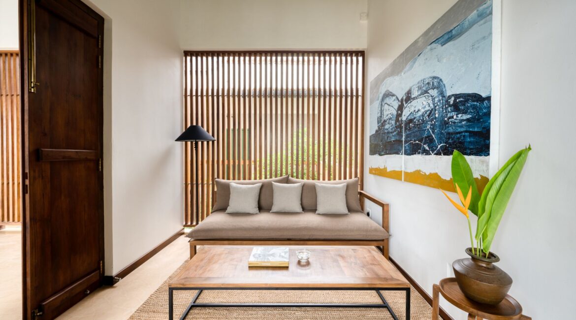 Kayaam House Sri Lanka – Palm Suite with elegant sitting area featuring contemporary furnishings and serene coastal tones