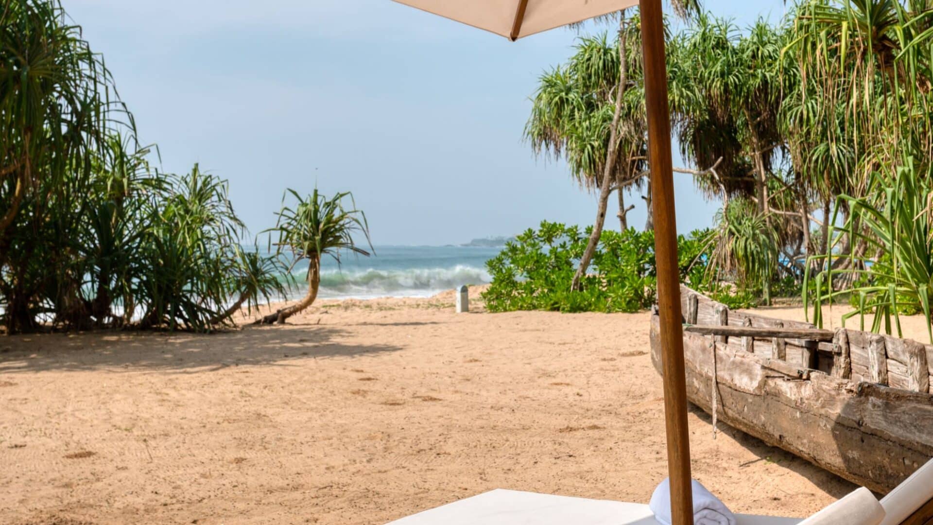 Kayaam House Sri Lanka – serene beachfront with comfortable day beds overlooking the Indian Ocean.