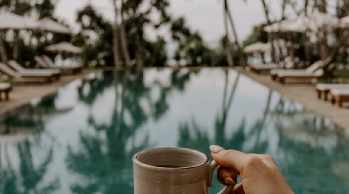 Kayaam House Sri Lanka – freshly ground morning coffee served poolside, with tranquil views across the garden and hints of the Indian Ocean beyond.