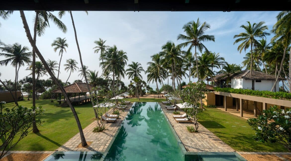 Kayaam House Sri Lanka – stunning drone footage capturing the swimming pool, manicured gardens, and the shimmering Indian Ocean beyond.