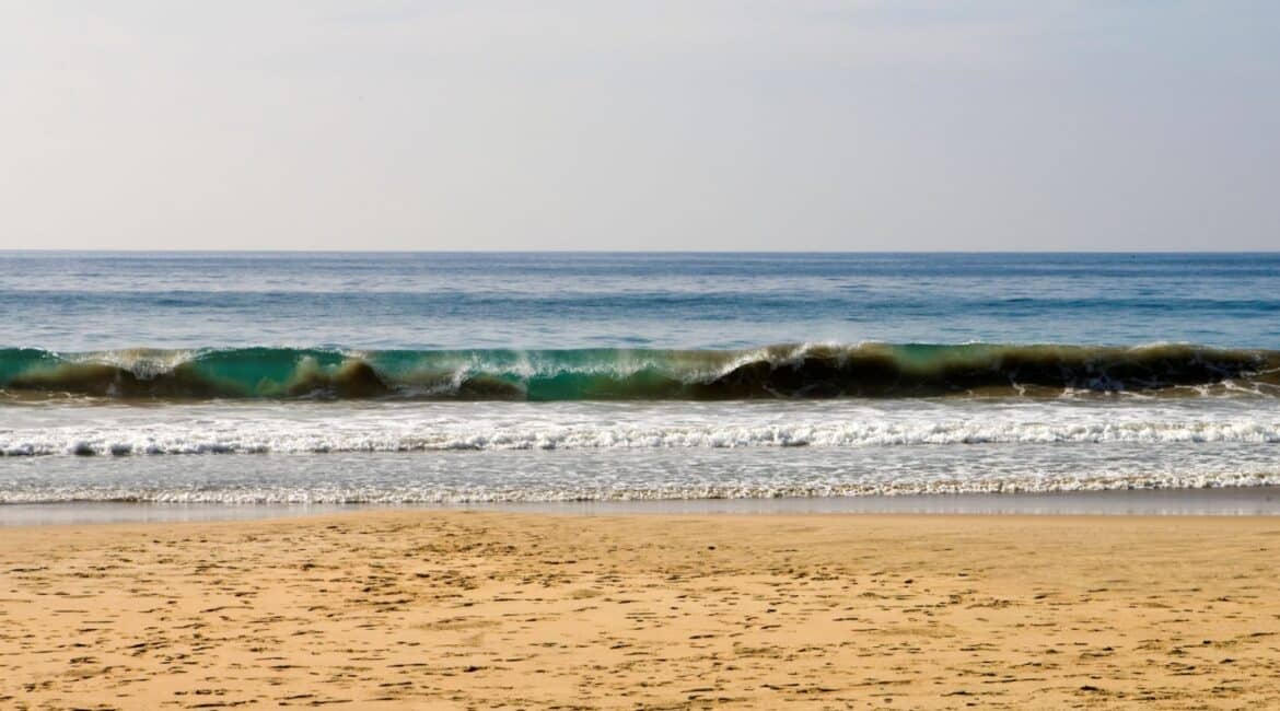 Mawella Beach in front of The Last House Tangalle, Sri Lanka – a serene stretch of golden coastline.