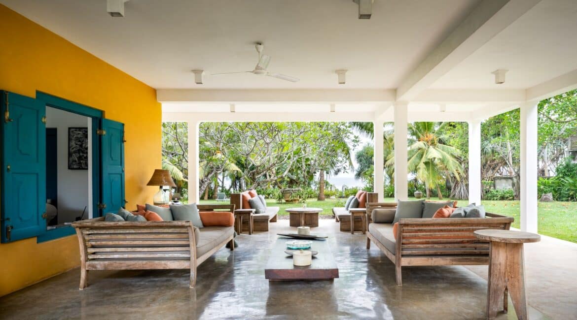 The Last House Tangalle Sri Lanka common areas beautiful furnished seating areas under the shade of a veranda