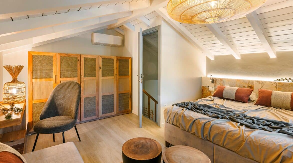 Elegant master bedroom with modern boho interiors at Villa Nikolis, Braunis Horio, Assos, Kefalonia