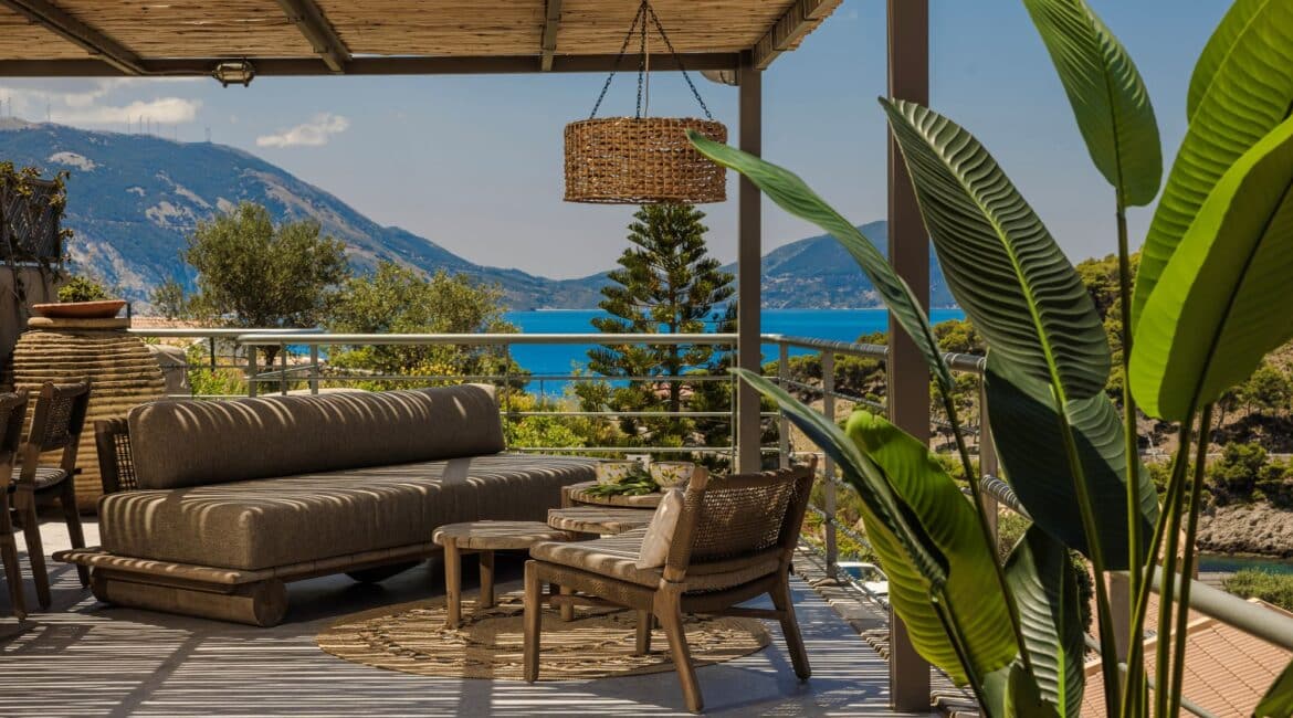 Gorgeous Terrace with dining pergola and comfy seating area overlooking Assos village and Venetian castle at Villa Nikolis, Braunis Horio, Assos, Kefalonia.