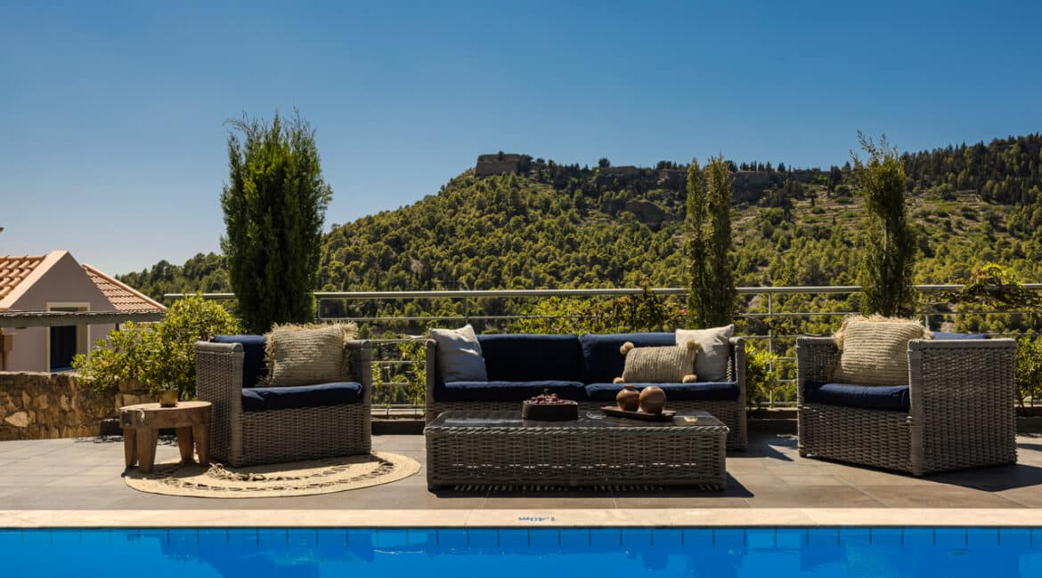 Villa Glaroni stylish alfresco lounge area with low-slung chairs Braunis Horio Kefalonia