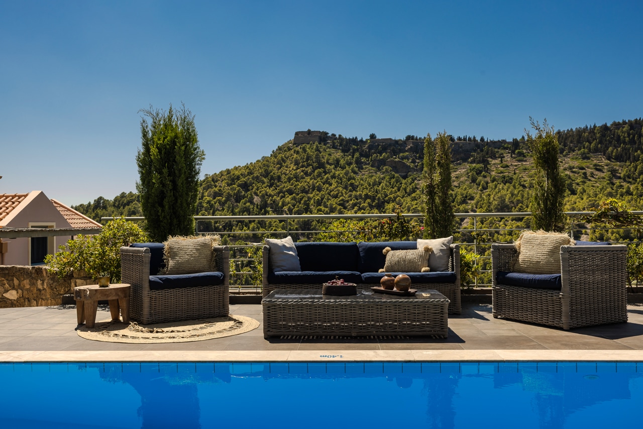 Villa Glaroni stylish alfresco lounge area with low-slung chairs Braunis Horio Kefalonia