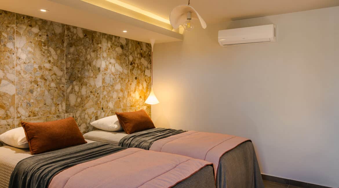 Villa Agapi contemporary twin bedroom with garden access Braunis Horio Kefalonia