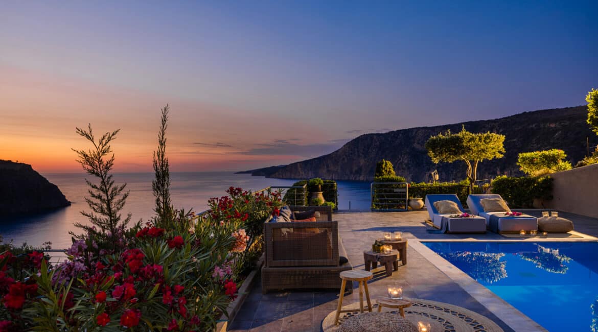 Villa Agapi swimming pool at sunset terrace with sun loungers Braunis Horio Kefalonia