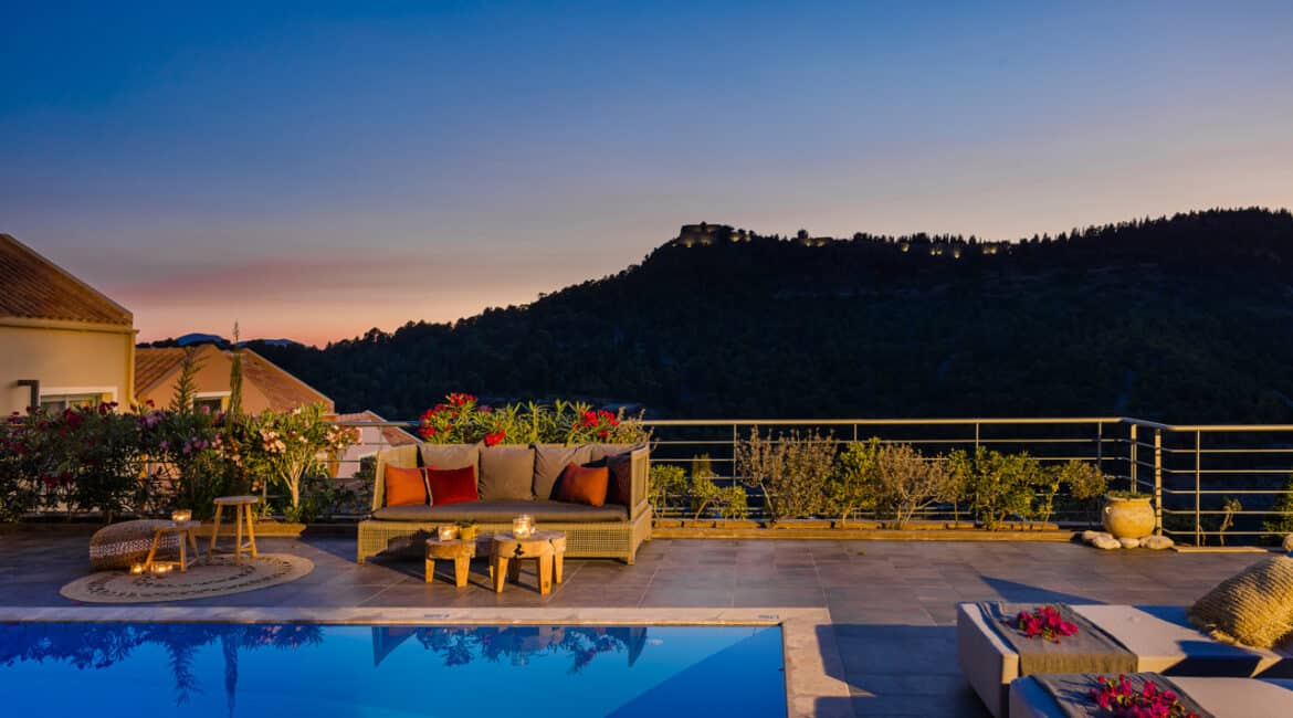 Villa Agapi swimming pool terrace with sun loungers by night Braunis Horio Kefalonia