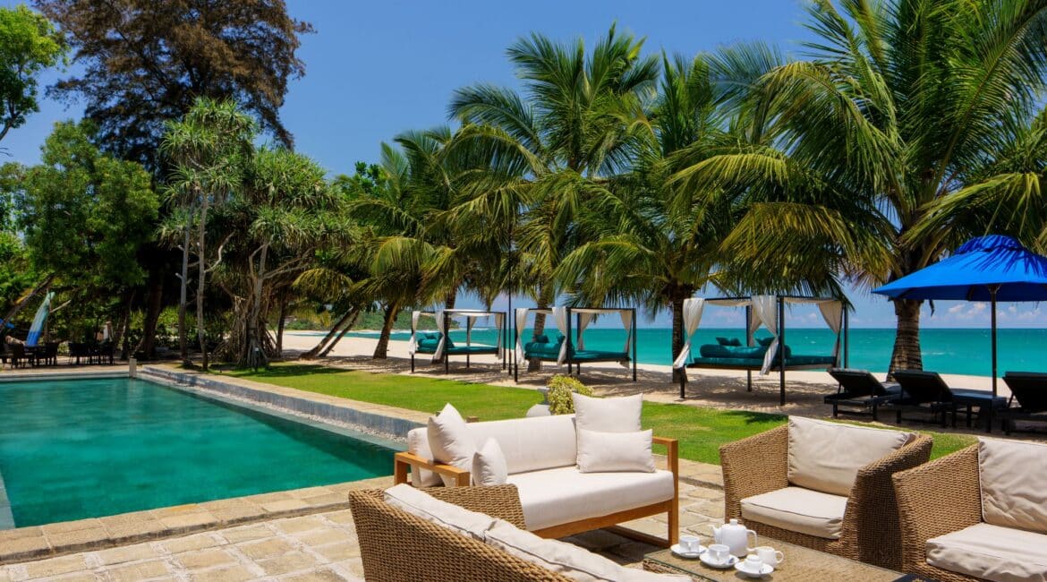 Lantern Boutique Hotel, Mirissa Sri Lanka – beachfront cabana with plush sofas, sweeping Indian Ocean views, and relaxed daytime vibes by the pool and sea