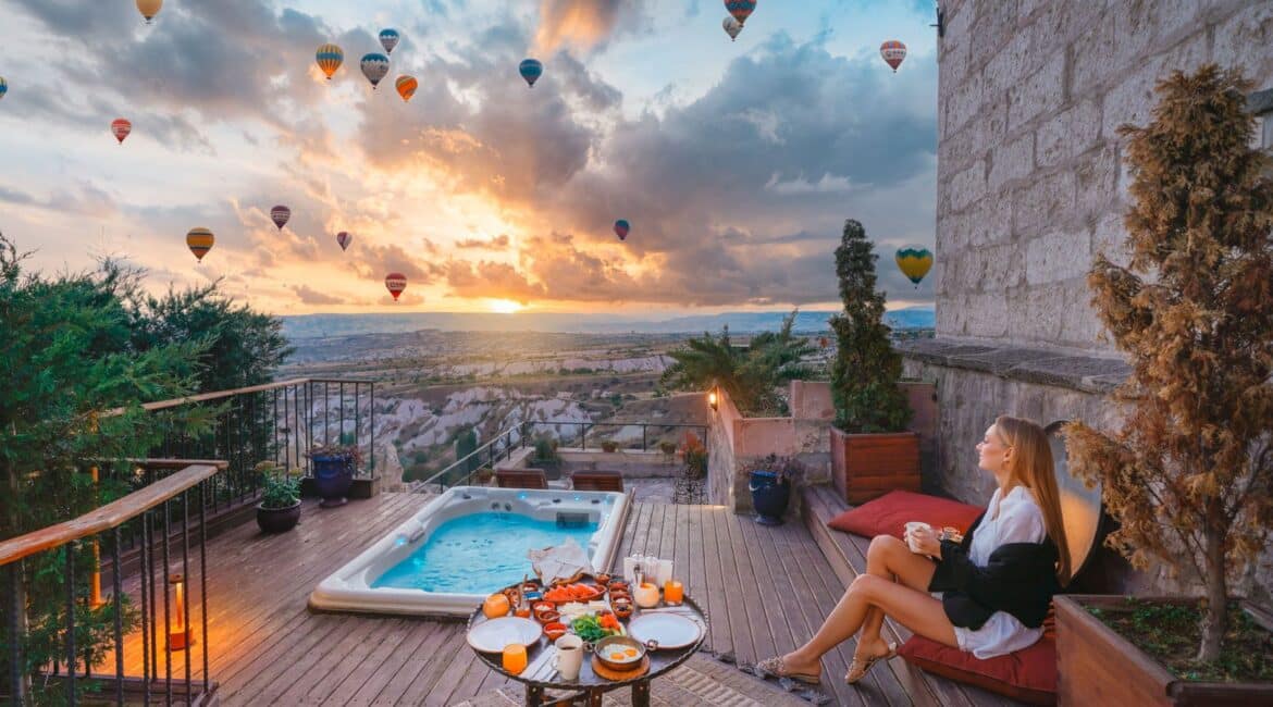 Taskonaklar Hotel with dramatic balloon skyline and far reaching views over the dreamy Cappadocian landscape from the wrap around terraces