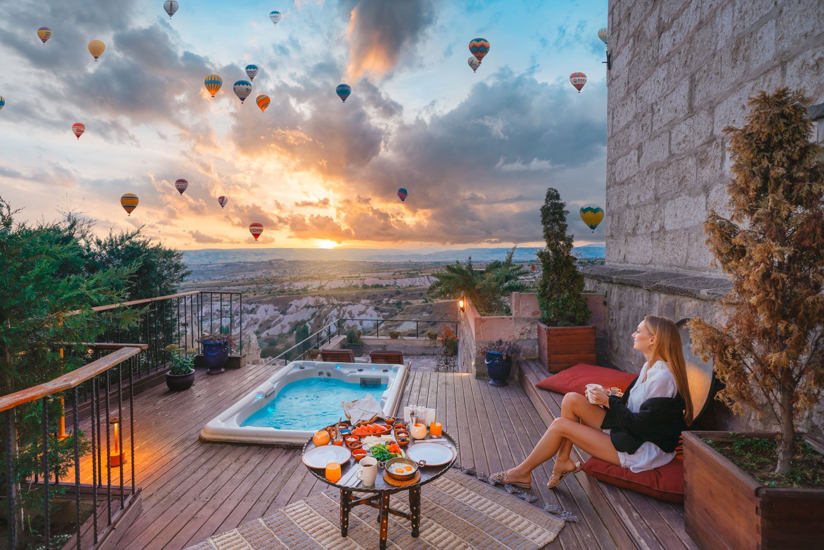 Taskonaklar Hotel with dramatic balloon skyline and far reaching views over the dreamy Cappadocian landscape from the wrap around terraces