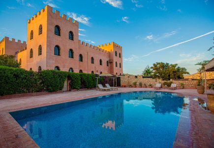 Atlas Kasbah pool and surrounding furnished terraces