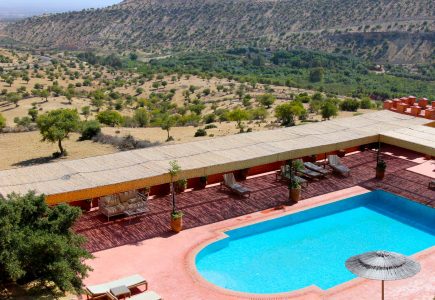 Atlas Kasbah swimming pool encased by undulating terrain