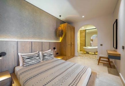 Junior Suite second bedroom with freestanding bath