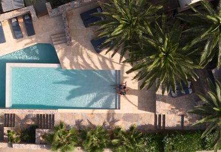 Paralos Irini Mare Agia Galini Crete aerial footage of swimming pool and gardens