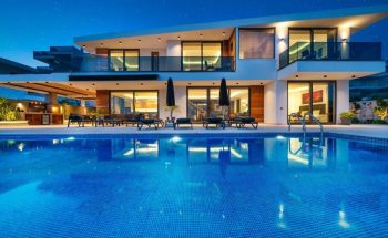 Villa Recep pool and house by night